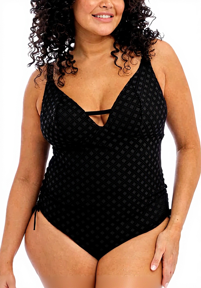 Pavo Monitor Arm installed on a wooden office desk