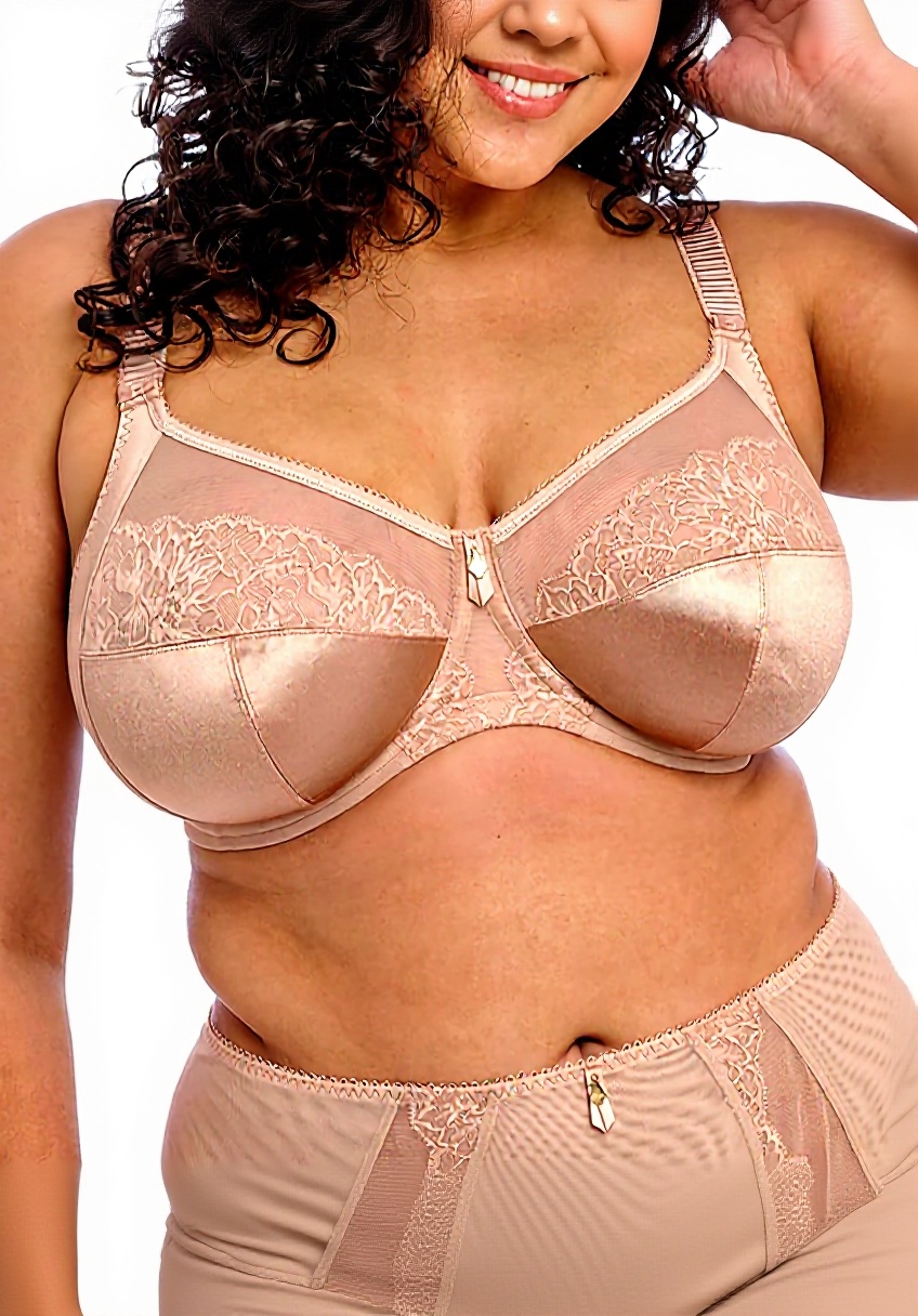 Pavo Monitor Arm installed on a wooden desk with cables organized